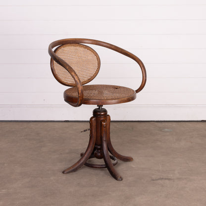 Rare antique French adjustable rotating Bentwood armchair with cane seat and back from Provence