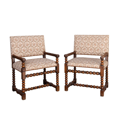 Lovely pair of floral upholstered armchairs with bobble arms and legs from Provence