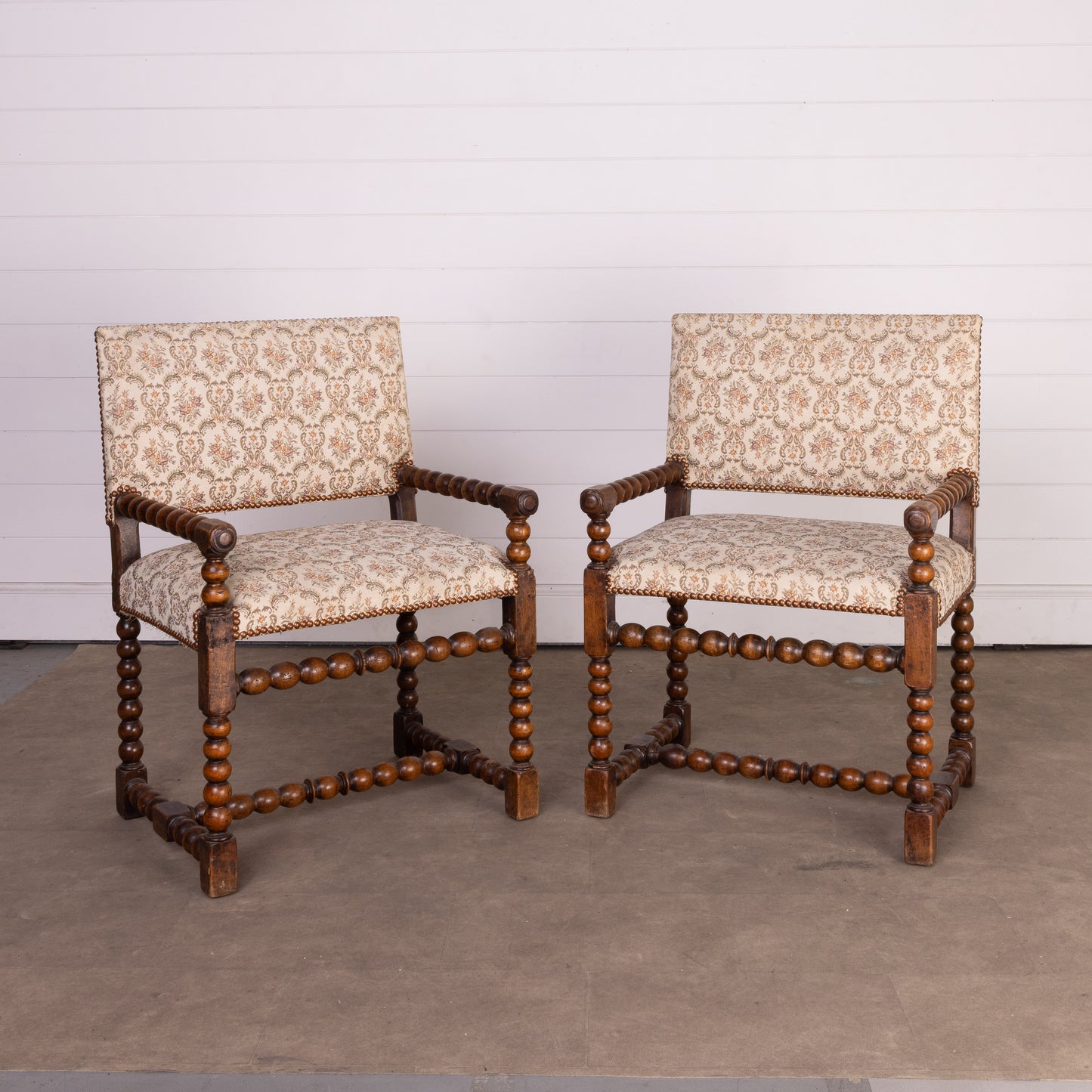 Lovely pair of floral upholstered armchairs with bobble arms and legs from Provence