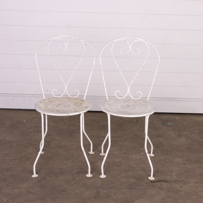 Set of 4 Vintage French outdoor wrought iron armchairs with a white patina