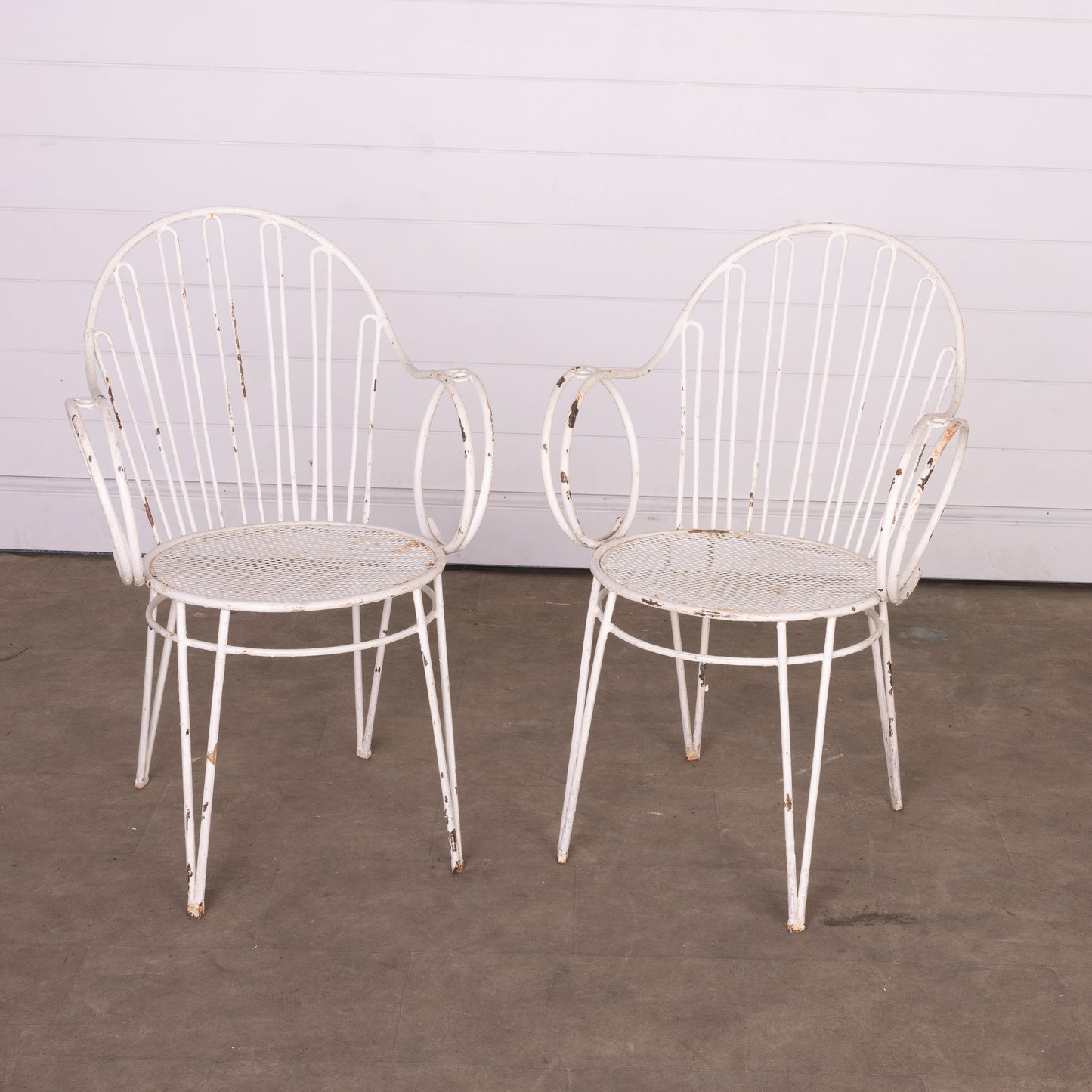 Pair of Vintage French wrought iron garden chairs