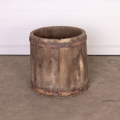 Beautiful impressive solid timber open barrel with metal bracing from a chateau garden near Annecy