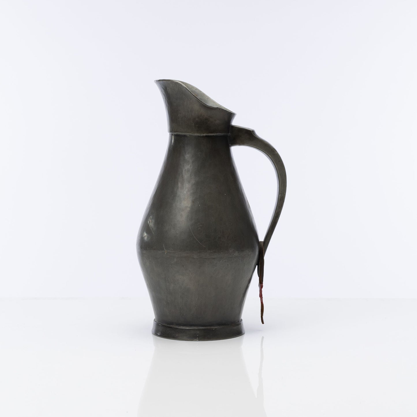 Large pewter water jug with aged patina from the French Alps