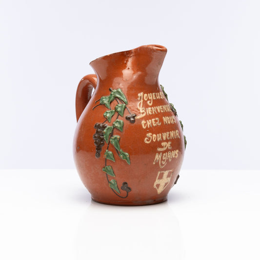 Antique French ‘Welcome’ Jug decorated with a grape vine design from the French Alps