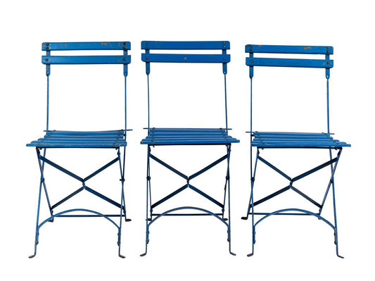 A French 20th century collapsible chairs with iron frame and blue painted timber slats.