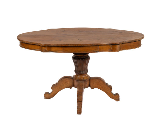 Lovely early 20th century antique French walnut pedestal table with scalloped edges and a central drawer.