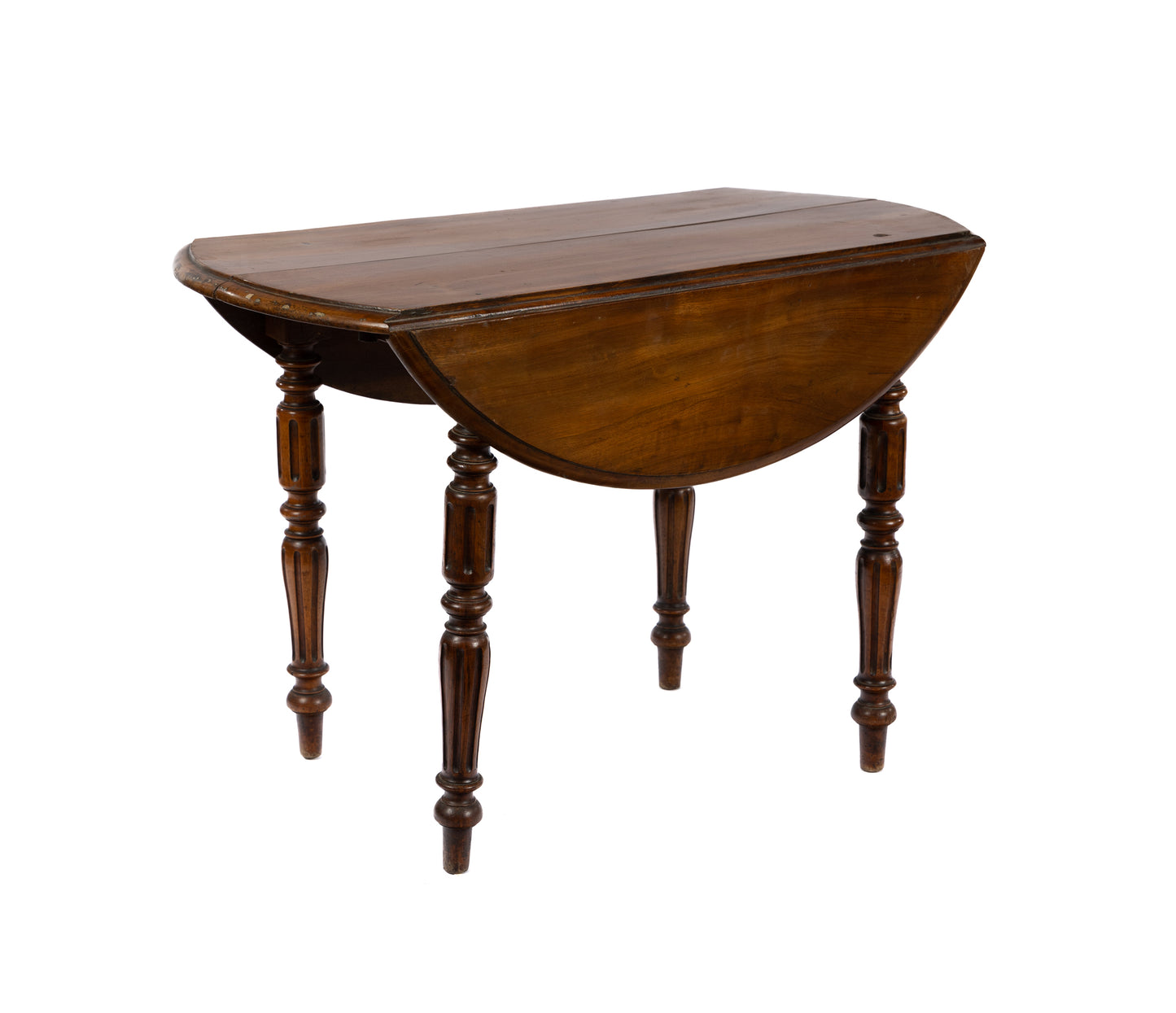 Classic 19th century antique French walnut table with turned legs and fold down sides. Discovered in The French Alps