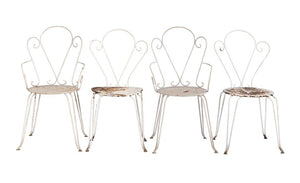 Lot of four vintage 20th Century French wrought iron chairs. Discovered in the French Alps