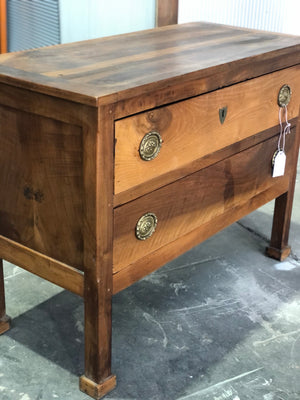 19th century French walnut commode with shield hardware