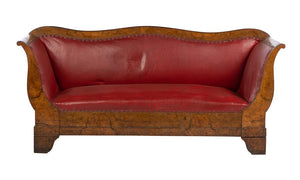 A 19th Century antique French red leather and mahogany club lounge from Paris