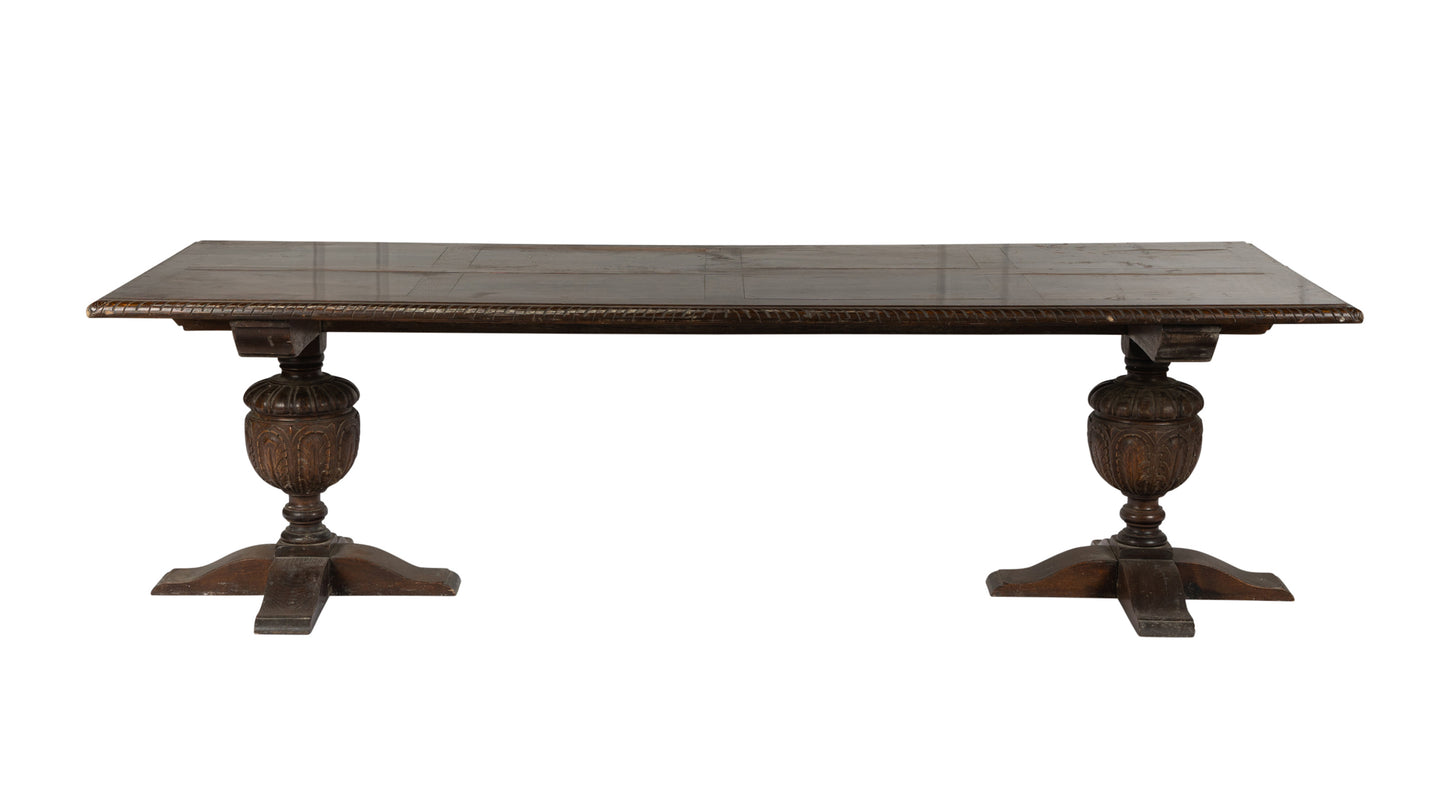 Impressive early 19th century antique French oak table with detailed hand carved bolstered legs