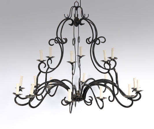 Impressive and oversized show-stopping 18 light hand forged iron chandelier from Paris